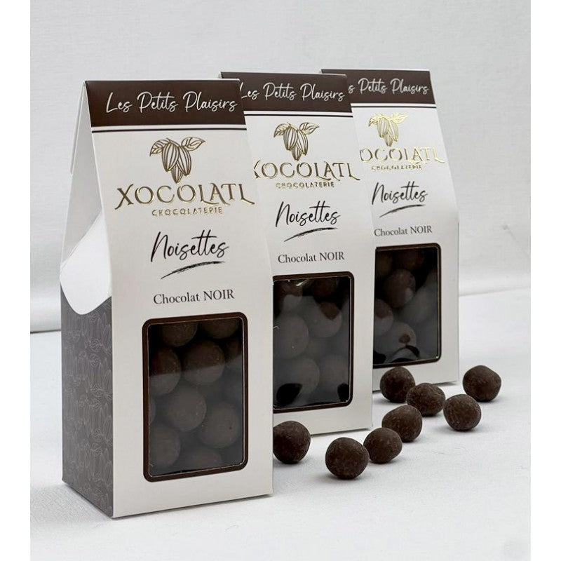 Noisettes enrobées de chocolat noir